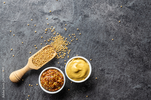 Obraz na płótnie Yellow mustard and whole grain mustard.