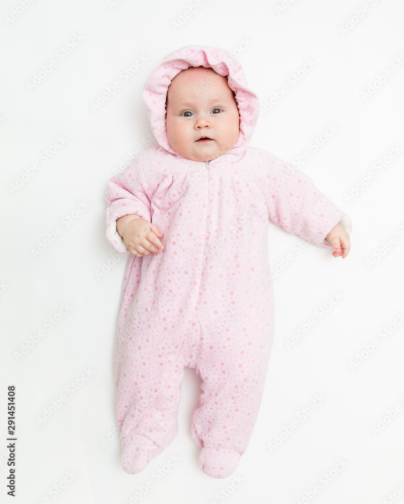 Cute baby dressed in warm overall for winter cold weather. Cute baby dressed in warm overall for winter cold weather.