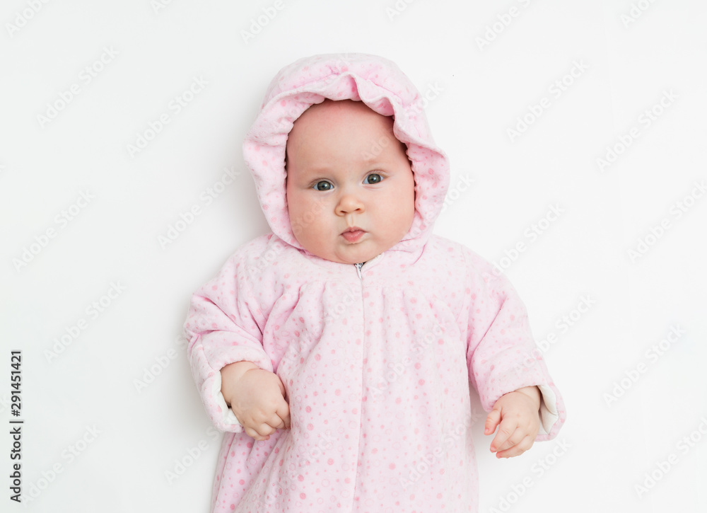 Cute baby dressed in warm overall for winter cold weather. Cute baby dressed in warm overall for winter cold weather.