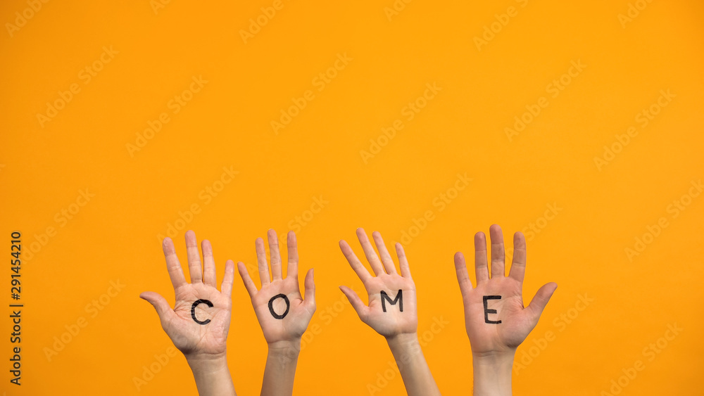 Come written palms on orange background, activist hands, project presentation