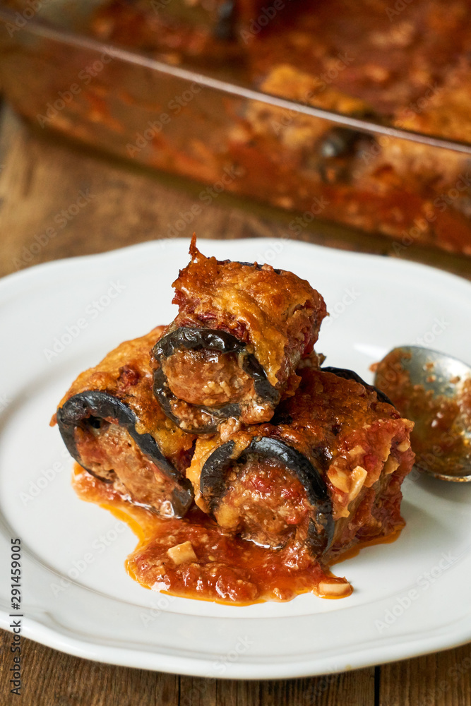 Eggplant rolls with minced meat and cheese in tomato sauce Eggplant rolls with minced meat and cheese in tomato sauce