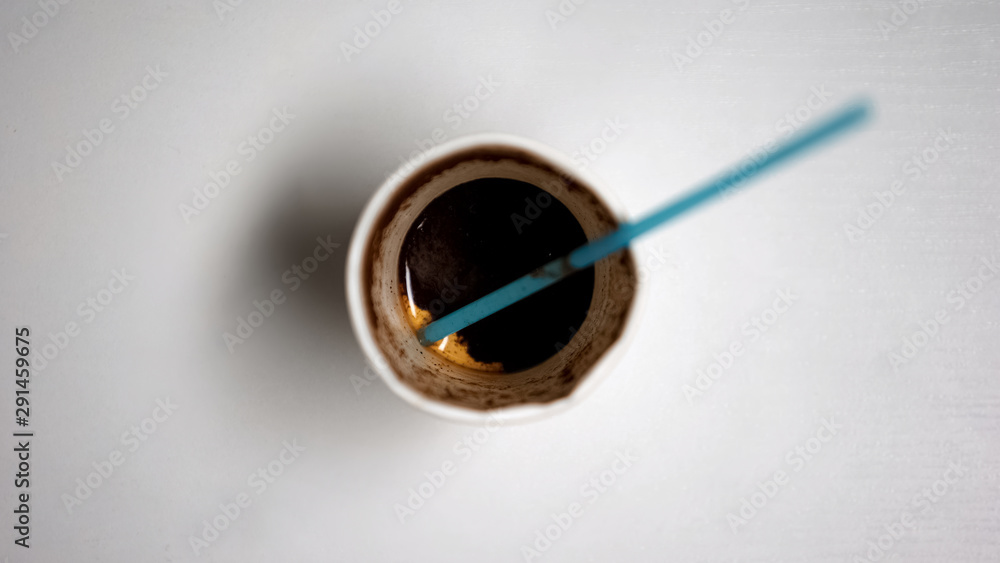Disposable paper coffee cup with straw standing on white background recycling Disposable paper coffee cup with straw standing on white background recycling