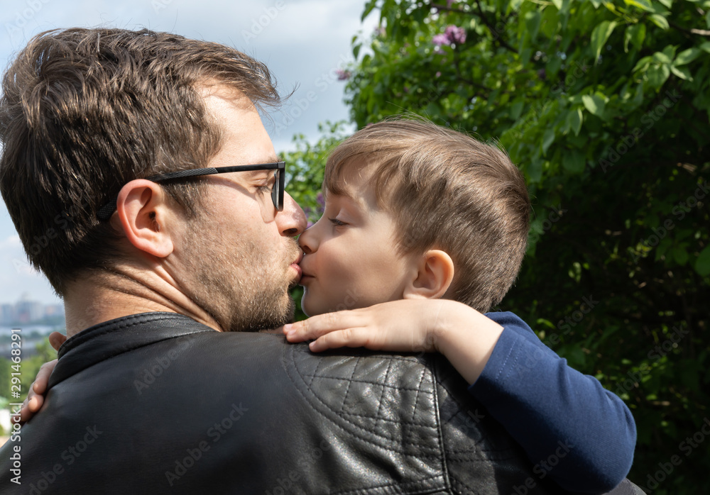 ather kisses his little son ather kisses his little son