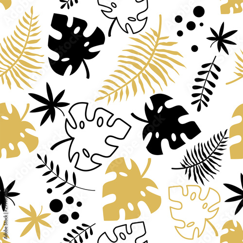Seamless pattern with black and gold tropical leaves
