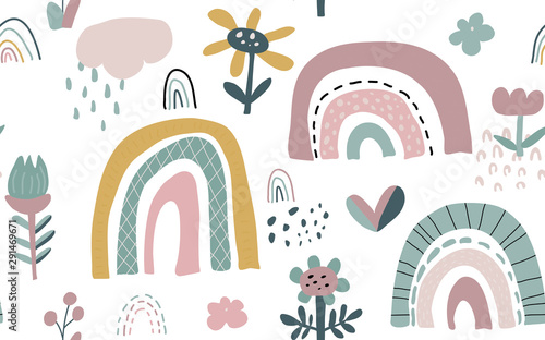 Vector seamless pattern with rainbow and flowers. Childish texture for fabric, textile, apparel