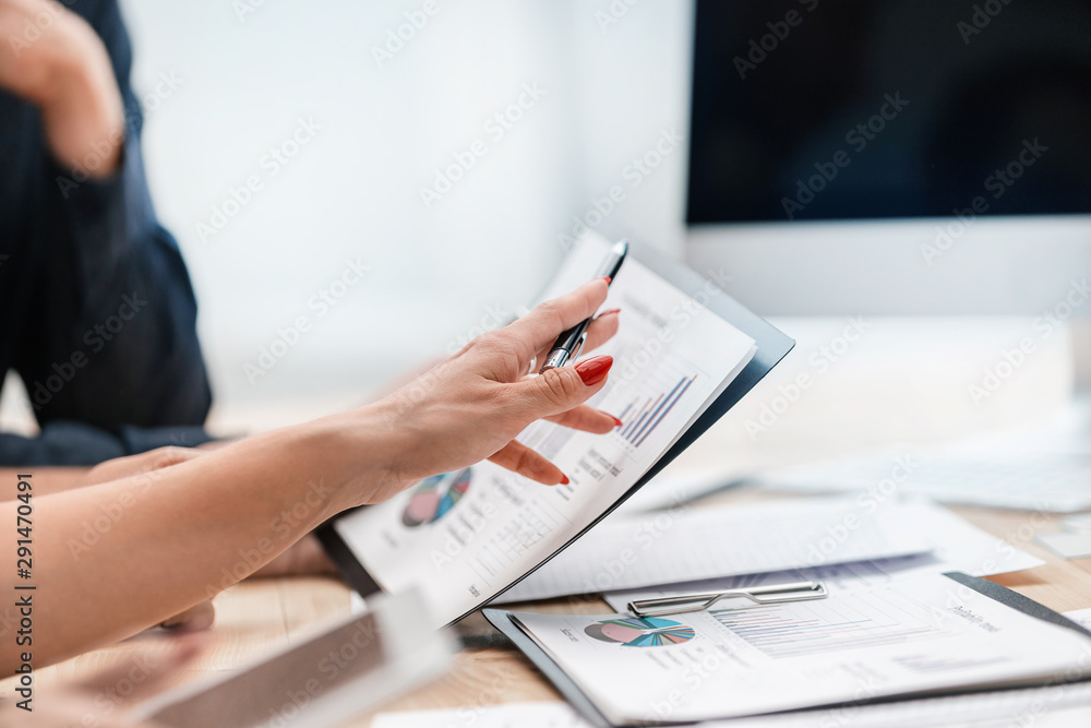 close up. business team discussing a financial report. close up. business team discussing a financial report.