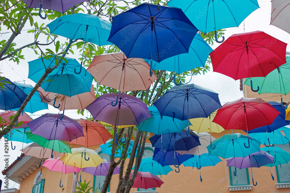 Colorful umbrellas background. Colorful umbrellas in the sky. Street decoration. in Venezia Hua Hin & Cha-am Thailand