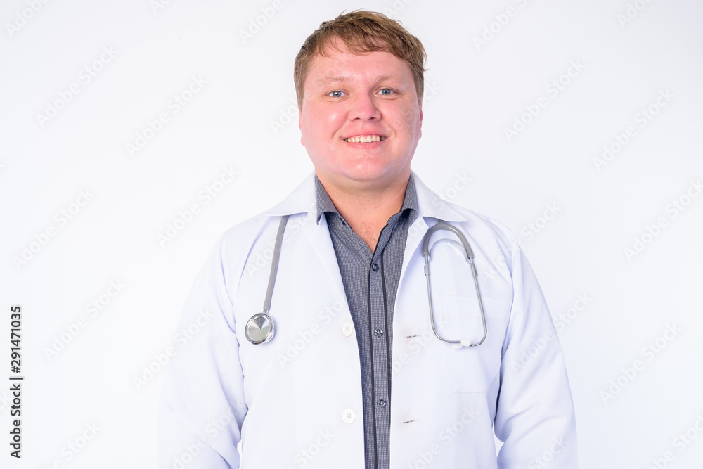 Face of happy overweight man doctor smiling Face of happy overweight man doctor smiling