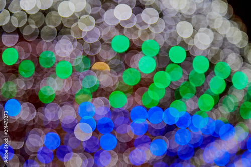 Abstract texture with light bokeh and black background