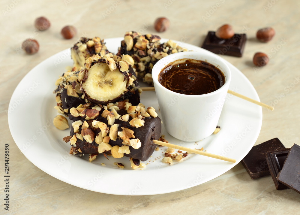 Frozen banana in chocolate and hazelnuts Frozen banana in chocolate and hazelnuts