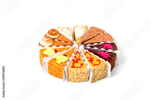 Set of different pieces of cakes isolated on white background