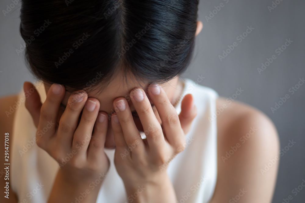 asian woman suffering from depression, headache, burnout; health care concept asian woman suffering from depression, headache, burnout; health care concept
