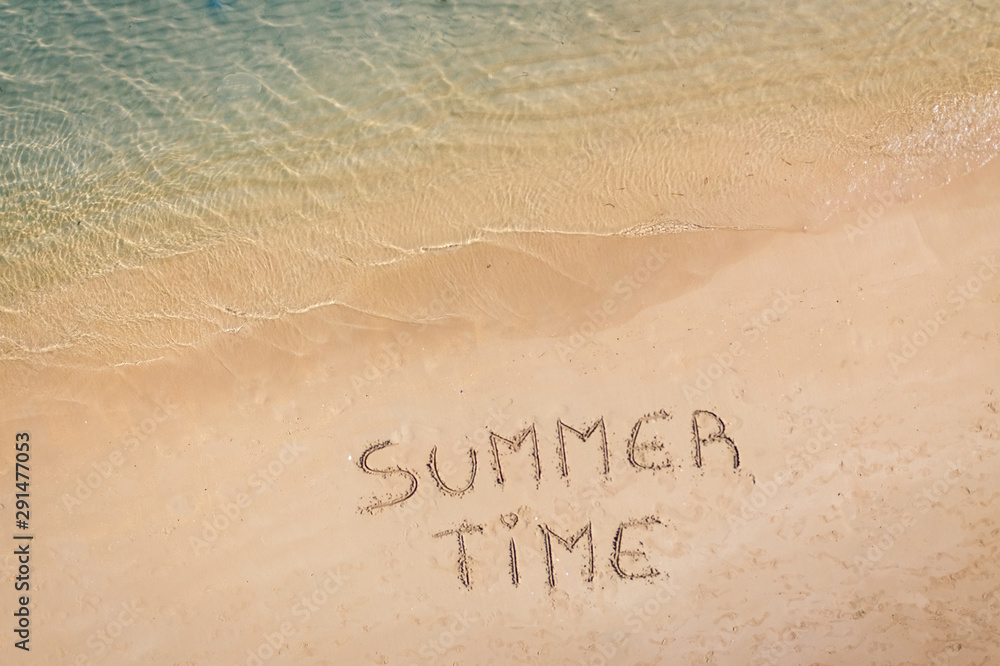 Fototapeta premium Drone view of the inscription on the sand