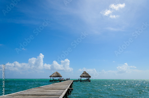 Paradise tropical turquoise sea landscape with wooden pier