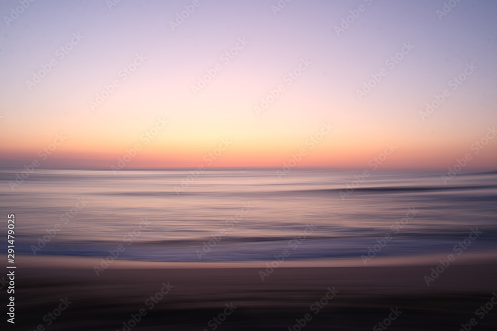 Sunrise long exposure panorama at the beach