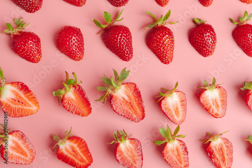 Strawberries on pink background. Fresh organic food concept