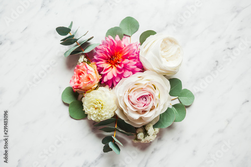 Wedding composition on the white marble background