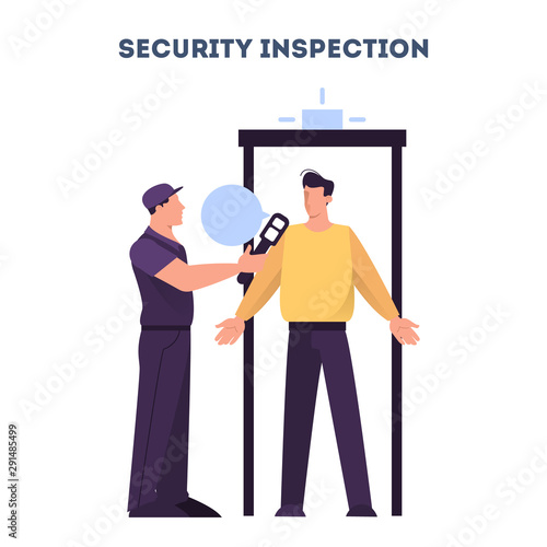 Man going through the metal scanner. Security control