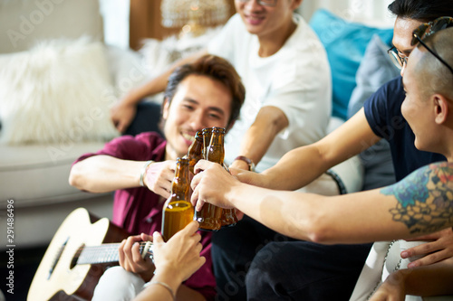 young asian adults partying at home © imtmphoto