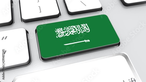 Saudi arabia flag on computer keyboard. photo