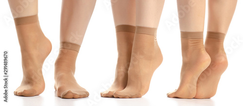 Schilderij op canvas Set female legs in nylon socks on white background isolation