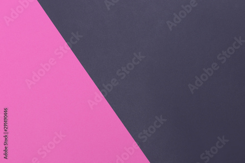 Paper pink  black empty background  geometrically located. Color blank for presentations  copy space.