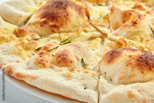 Delicious fried focaccia with rosemary closeup