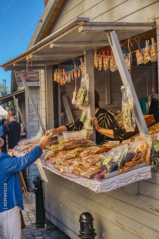 trade in herbs and mixtures of spices packed in bags, street sale of local spices at the fair