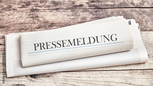 Pressemeldung oder Pressemitteilung als Zeitung photo