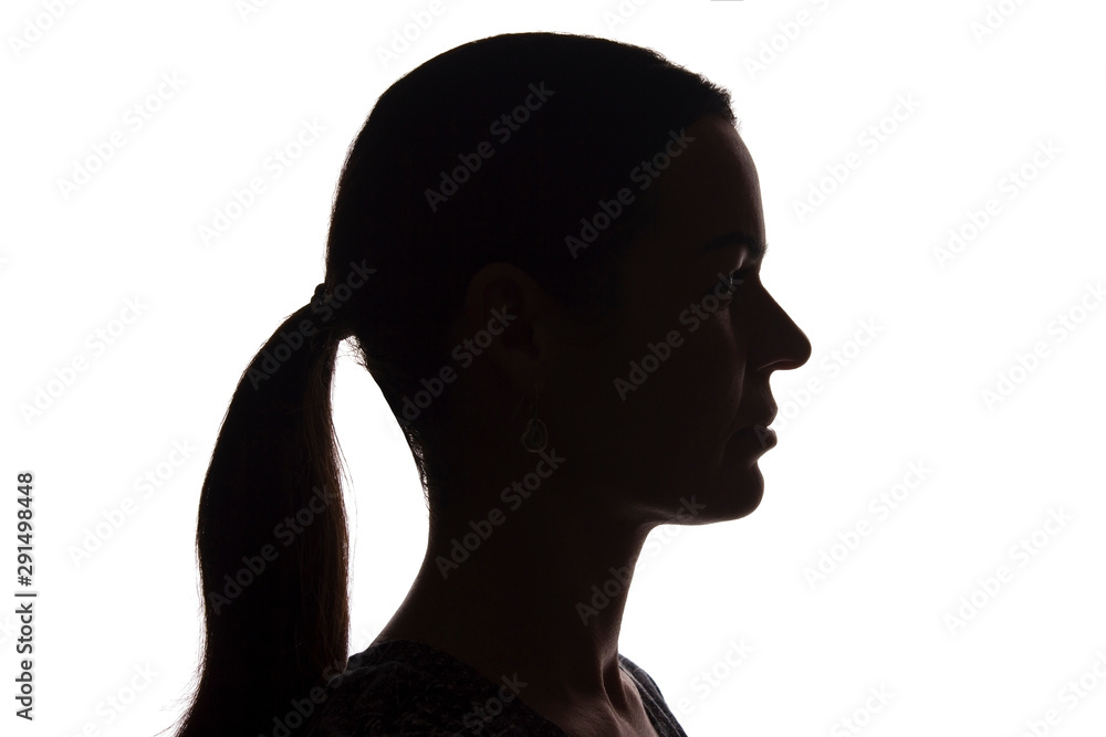 Silhouette young girl side view with lock of hair - isolated Silhouette young girl side view with lock of hair - isolated