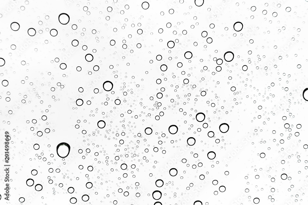 Rain drops on window glasses surface Natural Pattern of raindrops. Natural pattern of raindrops on white background for your design. Rain drops on window glasses surface Natural Pattern of raindrops. Natural pattern of raindrops on white background for your design.