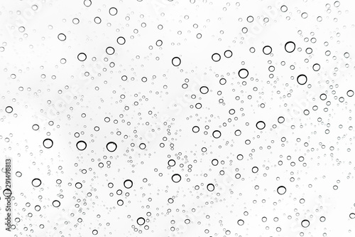 Rain drops on window glasses surface Natural Pattern of raindrops. Natural pattern of raindrops on white background for your design.