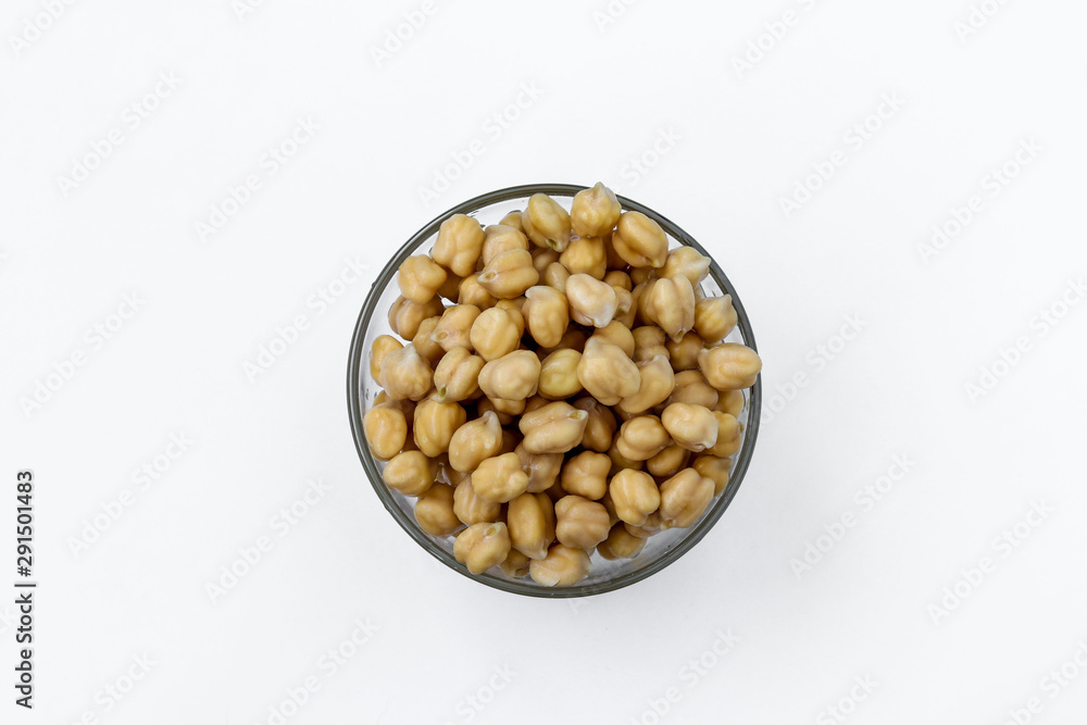 Boiled chickpea in a transparent bowl on white background, concept is healthy eating, horizontal orientation, top view Boiled chickpea in a transparent bowl on white background, concept is healthy eating, horizontal orientation, top view
