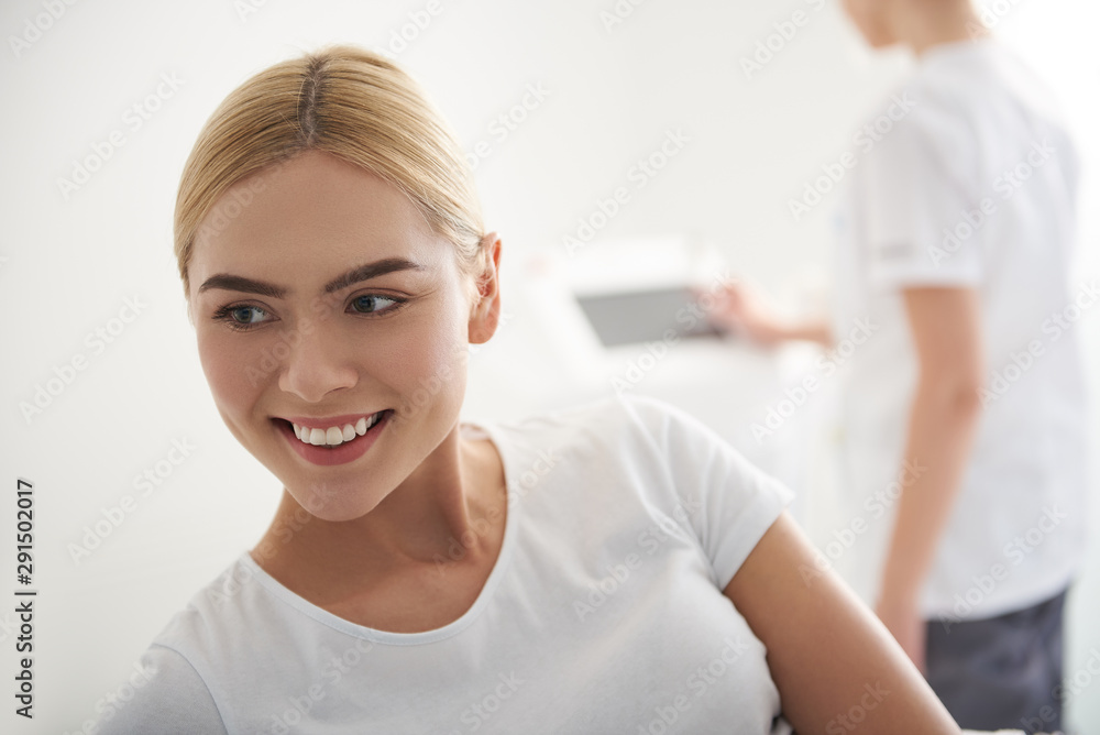 Charming young woman is expressing positive emotions Charming young woman is expressing positive emotions