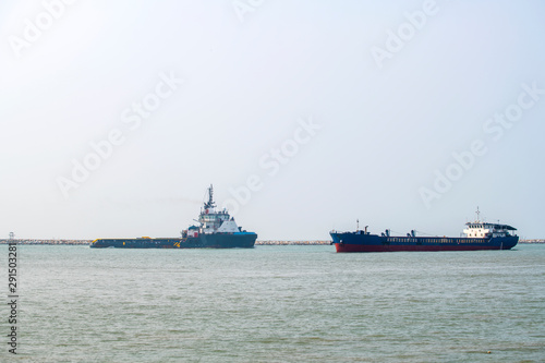 Cargo ship in the sea in poor weather days  