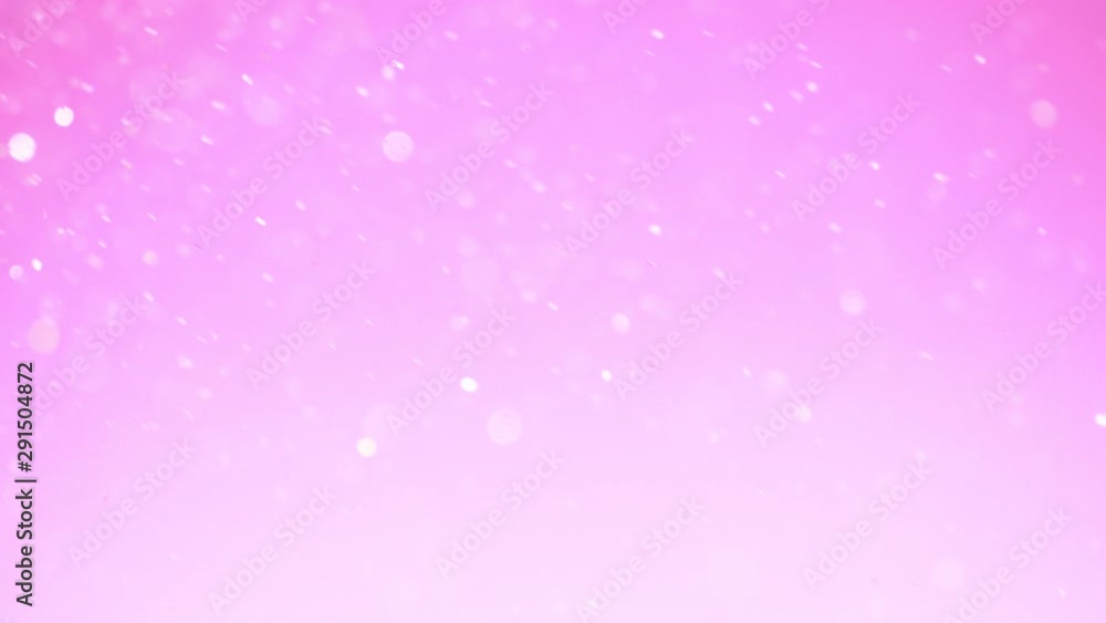 Super slow motion of glittering pink particles. Shallow depth of focus. Filmed on high speed cinema camera, 1000 fps. Super slow motion of glittering pink particles. Shallow depth of focus. Filmed on high speed cinema camera, 1000 fps.