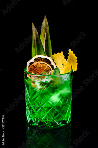 classic melonics cocktail with reflection on dark background photo