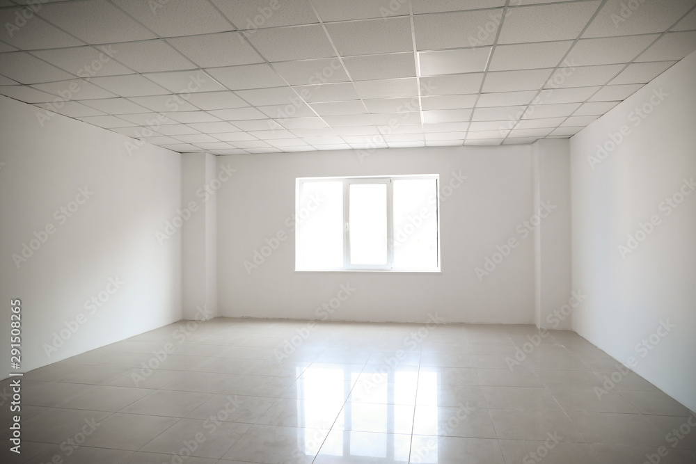 View of spacious room with window View of spacious room with window