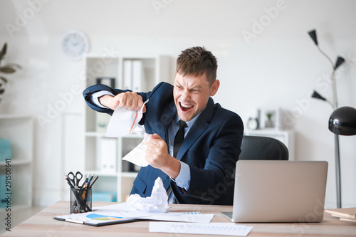 Portrait of angry businessm...