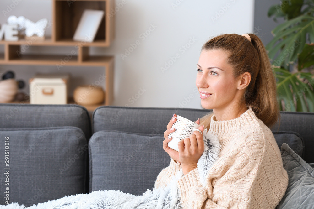 Beautiful young woman drinking coffee at home Beautiful young woman drinking coffee at home