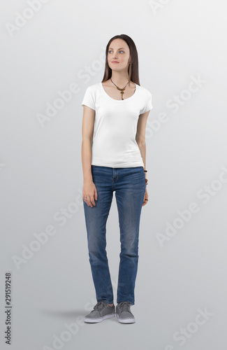 Female model wearing white plain t shirt in blue denim jeans pant.