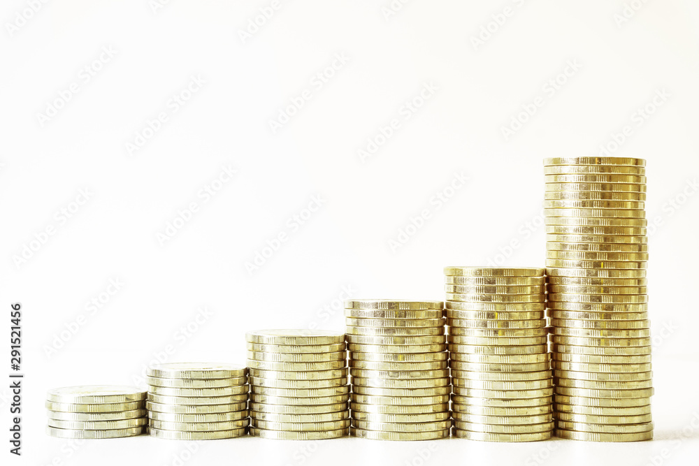 Coins stacked on each other in different positions. Saving money and account finance bank business concept. Business Finance and Money concept,Save money for prepare in the future.time is money concep Coins stacked on each other in different positions. Saving money and account finance bank business concept. Business Finance and Money concept,Save money for prepare in the future.time is money concep