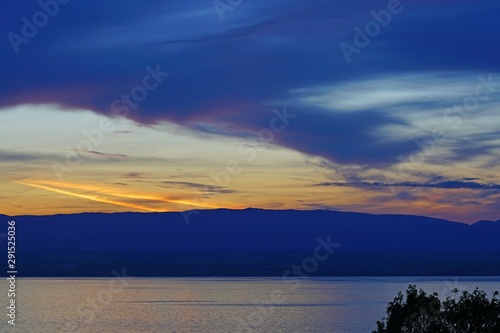 Colorful sunset sky over Lake Geneva in Evian-les-Bains  Haute-Savoie  France