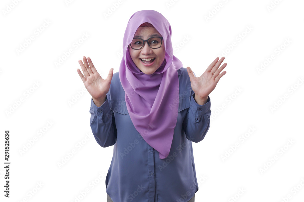 Muslim Lady Smiling with Winning Gesture Muslim Lady Smiling with Winning Gesture