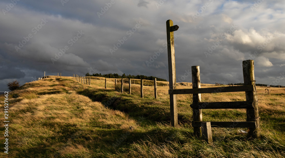Footpath post and a style at the top of Coombe's Edge in the Peak District