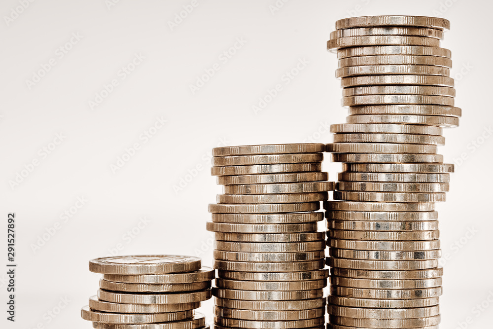 Coins stack Close up. Concept of investment growth, business success and savings on white background with copy space Coins stack Close up. Concept of investment growth, business success and savings on white background with copy space