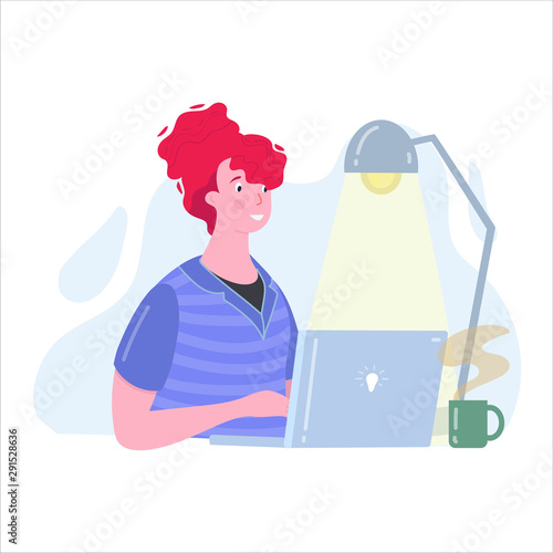 Woman sitting in front of the computer and working