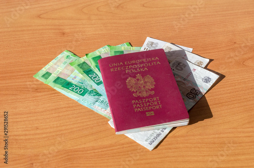 Polish biometric passport and Russian Currency.