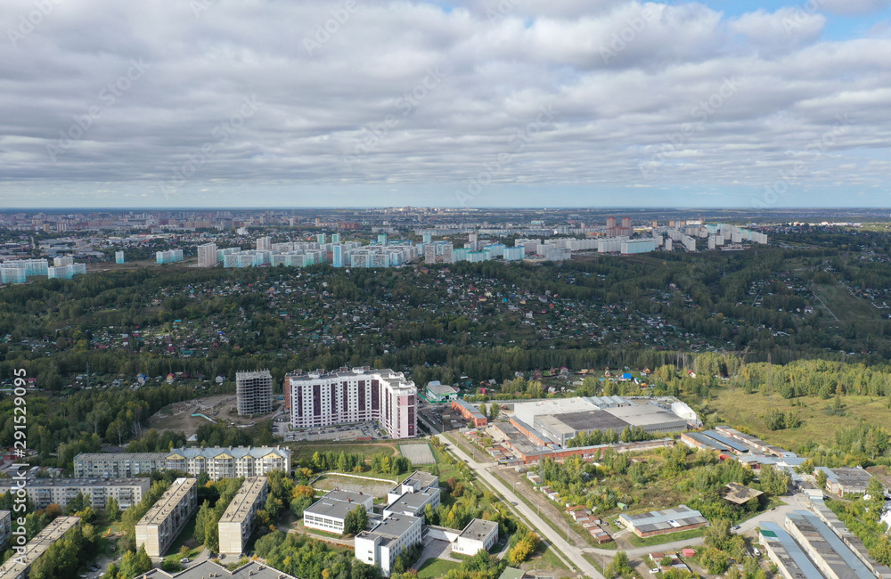 panorama of the Oktyabrsky district, on the horizon microdistrict MZHK, the city of Novosibirsk, Russia, month of September