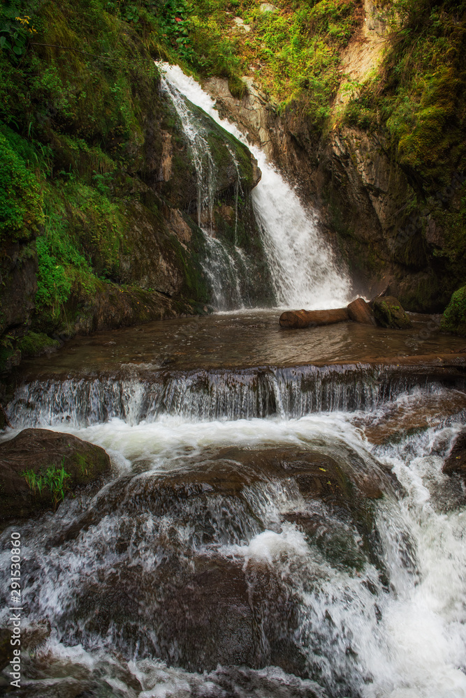 Fototapeta premium Chodor Waterfall at Lake Teletskoye in the Altai Mountains